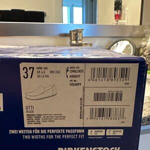 Black UTTI Birkenstock Flats with built in arch supports!